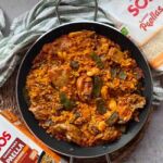 Paella con conejo y pollo